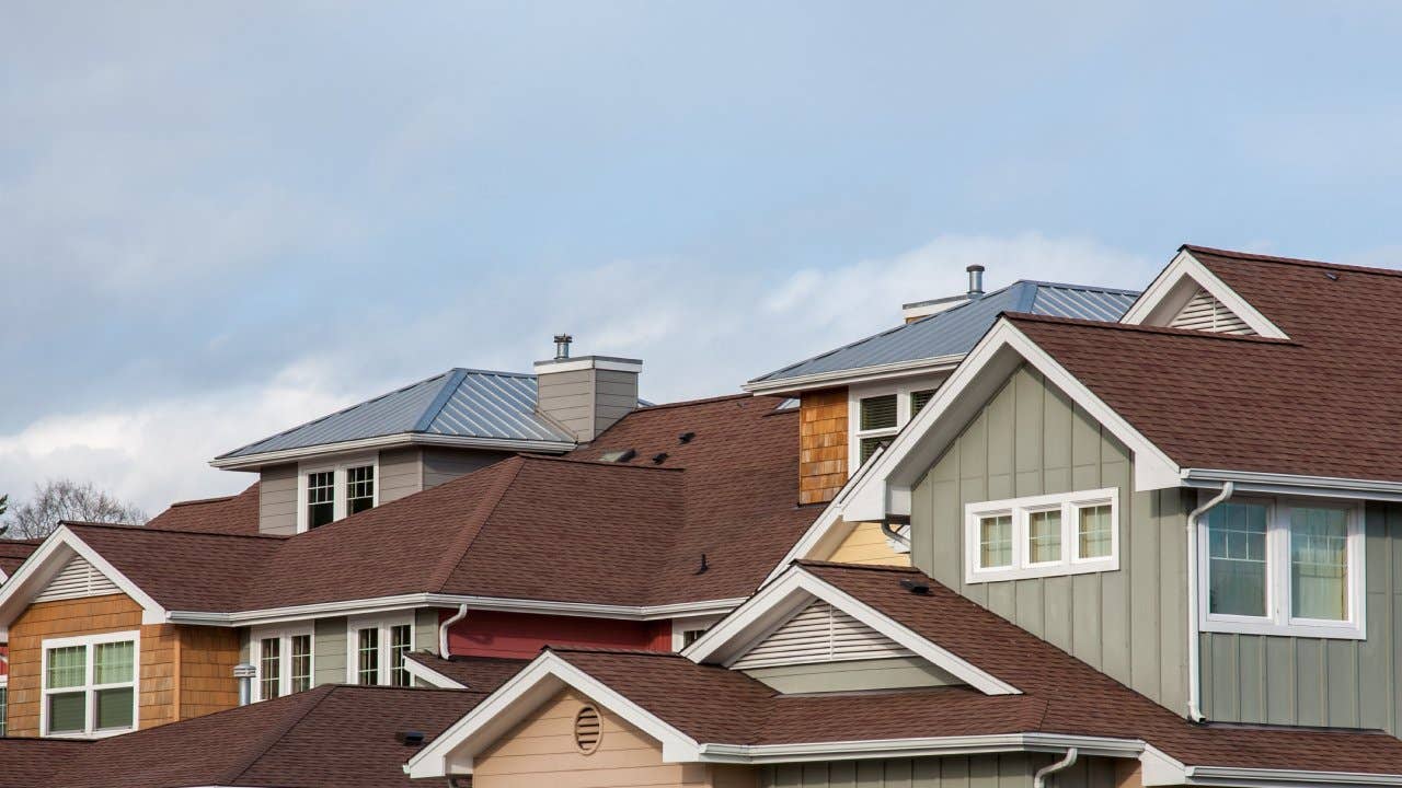 Condominiums with brightly colored siding.