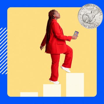 Woman climbing up bar graph stairs