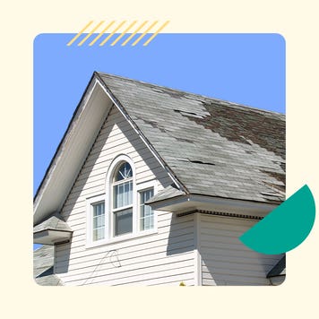 Shot of a house roof with damage and tiles that need to be replaced