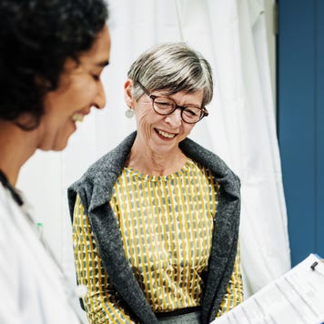 Doctor Going Over Test Results With Patient