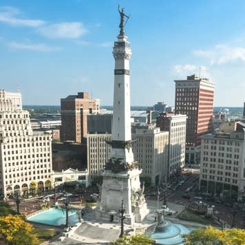 Rush hour right after sunrise over Indiana's Soldiers and Sailors Monument on Monument Circle, Indianapolis
