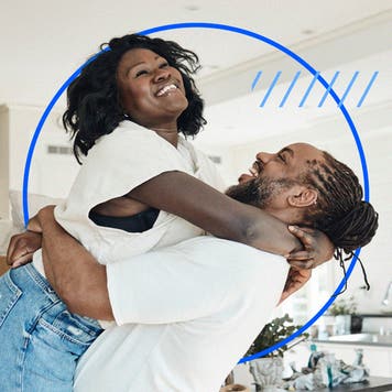 Two people hugging joyfully