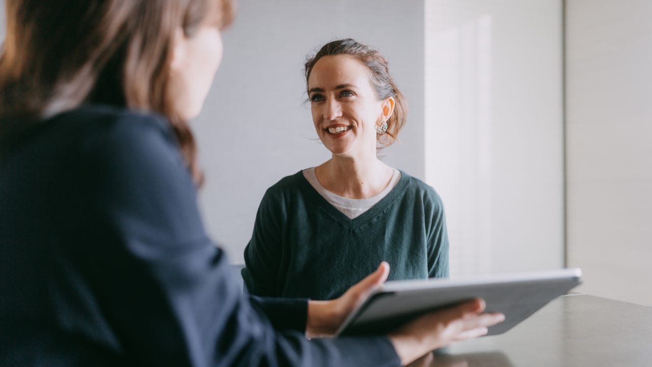 Woman meeting banker for financial advice