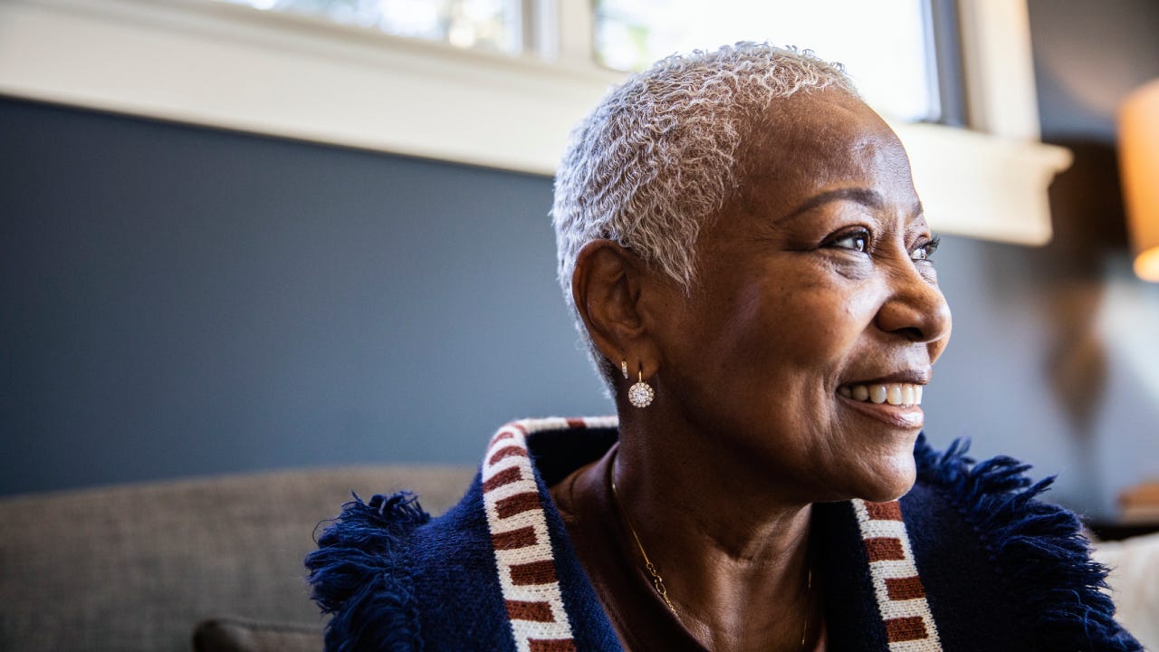 Portrait of senior woman in her home