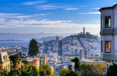 San Francisco - USA. Panoramic view of San Francisco with Coit Tower in the background on a clear winter day, seen from Lombard Street.