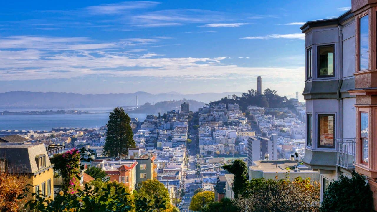 San Francisco - USA. Panoramic view of San Francisco with Coit Tower in the background on a clear winter day, seen from Lombard Street.