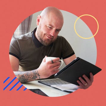 Illustration of man going over finances on a tablet at home