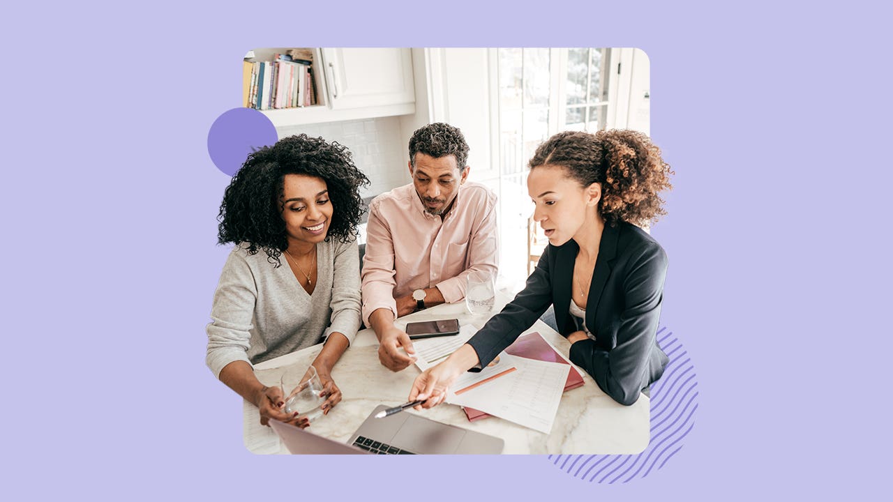 Three young professionals collaborating on a project