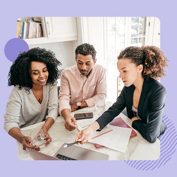 Three young professionals collaborating on a project