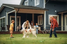 Grandfather Playing Ball with His Son and Grandchildren.