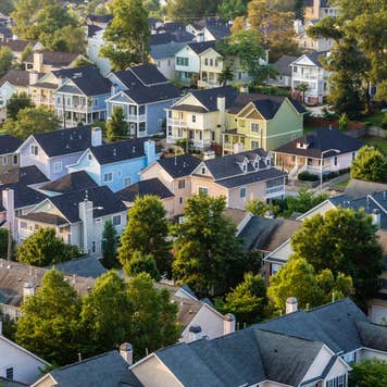 Aerial view of house roofs in suburban neighborhood