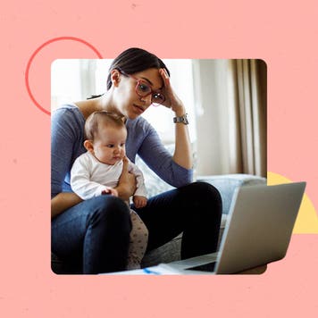 Distressed woman holding a baby looking for jobs on a laptop