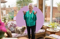 Older woman using resistance bands to exercise