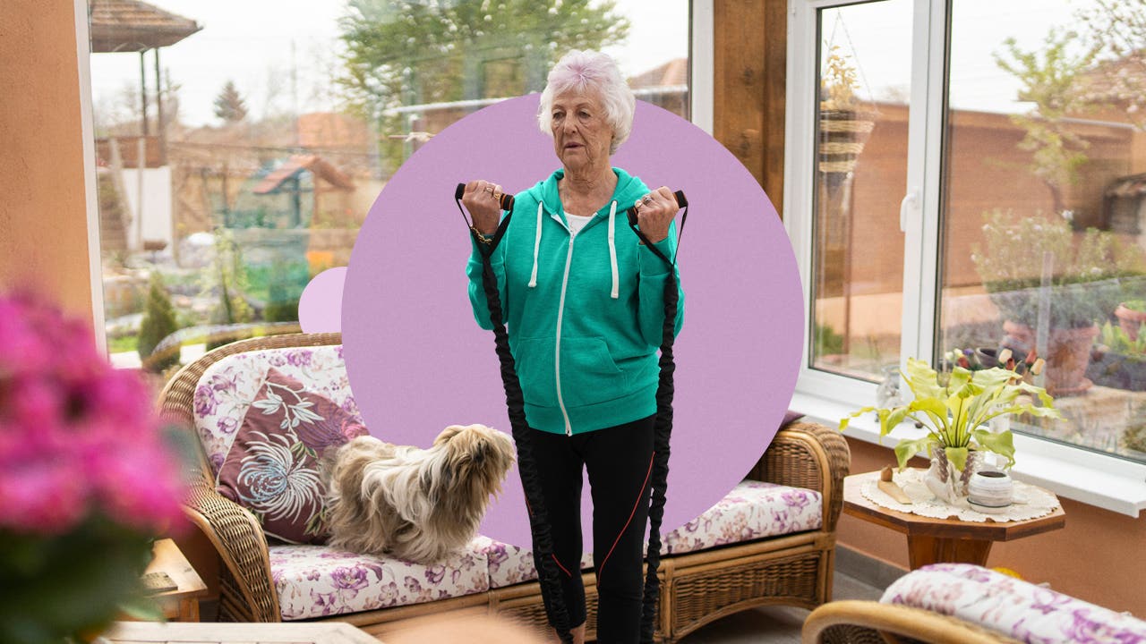 Older woman using resistance bands to exercise