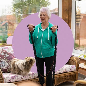 Older woman using resistance bands to exercise