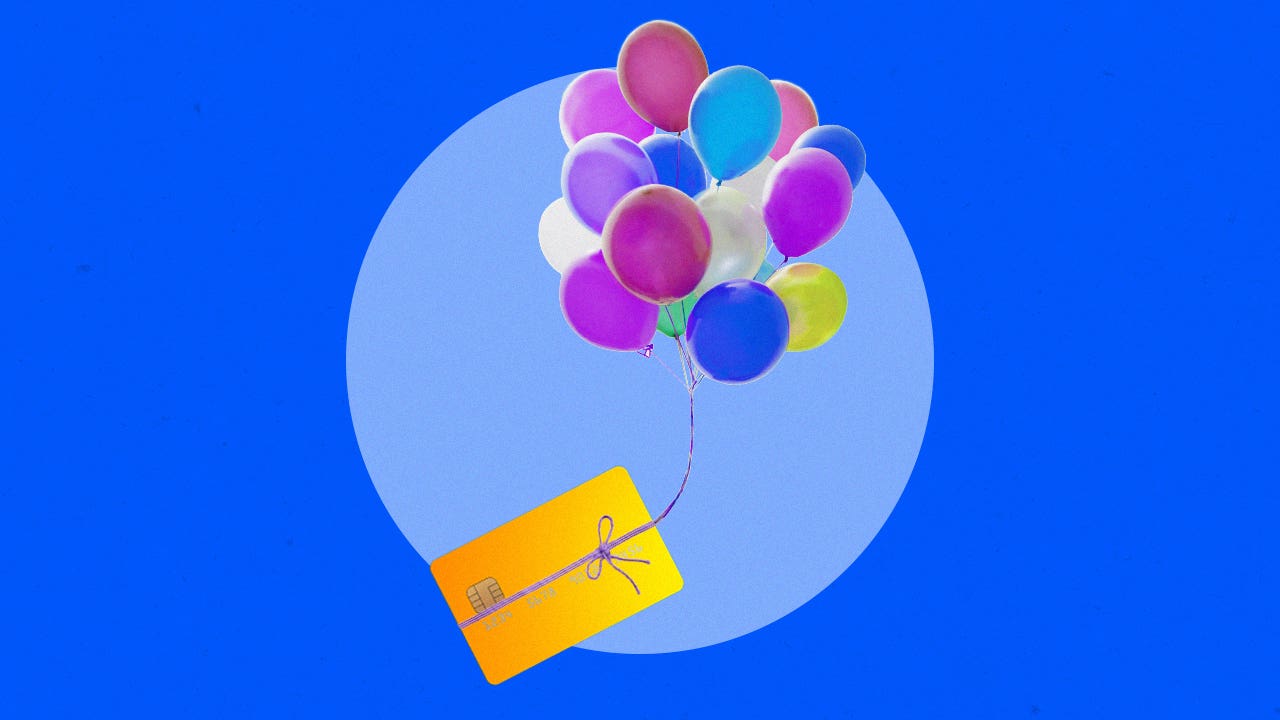 design element of a blue background with a bunch of ballons in the air with a credit card tied to the end of its strings