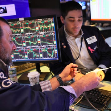 Traders on the floor of the New York Stock Exchange