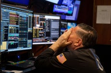 Trader on the floor of the New York Stock Exchange