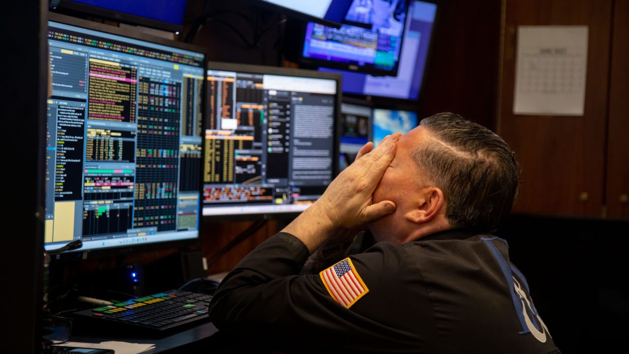 Trader on the floor of the New York Stock Exchange