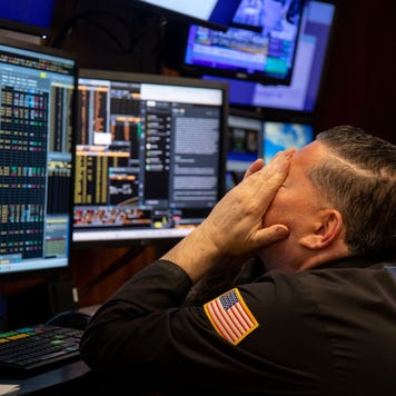Trader on the floor of the New York Stock Exchange
