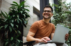 Happy man on laptop