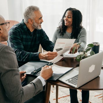 A couple meeting with a financial advisor