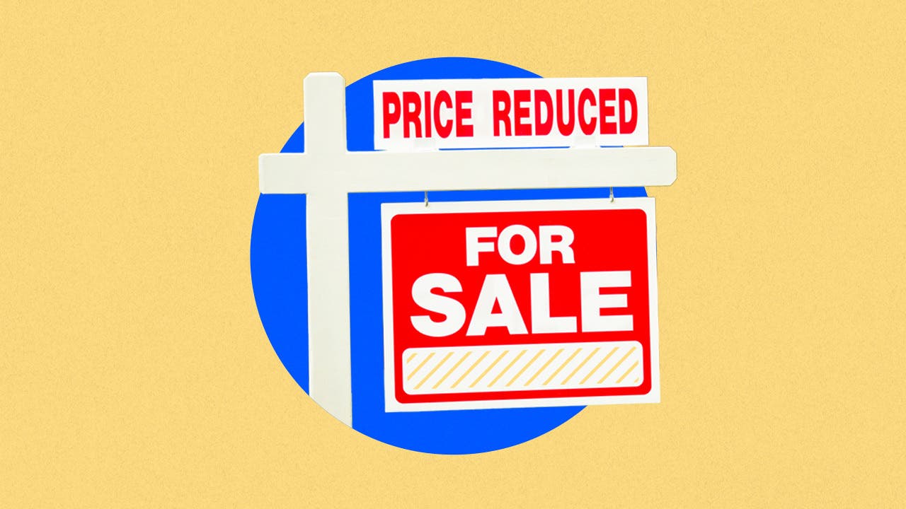 for sale - price reduced sign