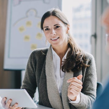 Financial advisor talking to clients