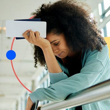 Woman leaning over and looking distraught