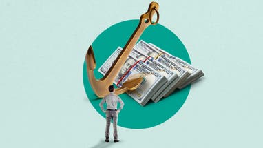 A man looking at a comically large stack of cash