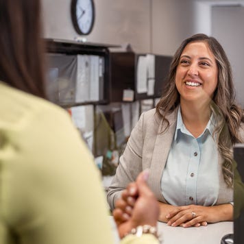 A friendly female customer service representative