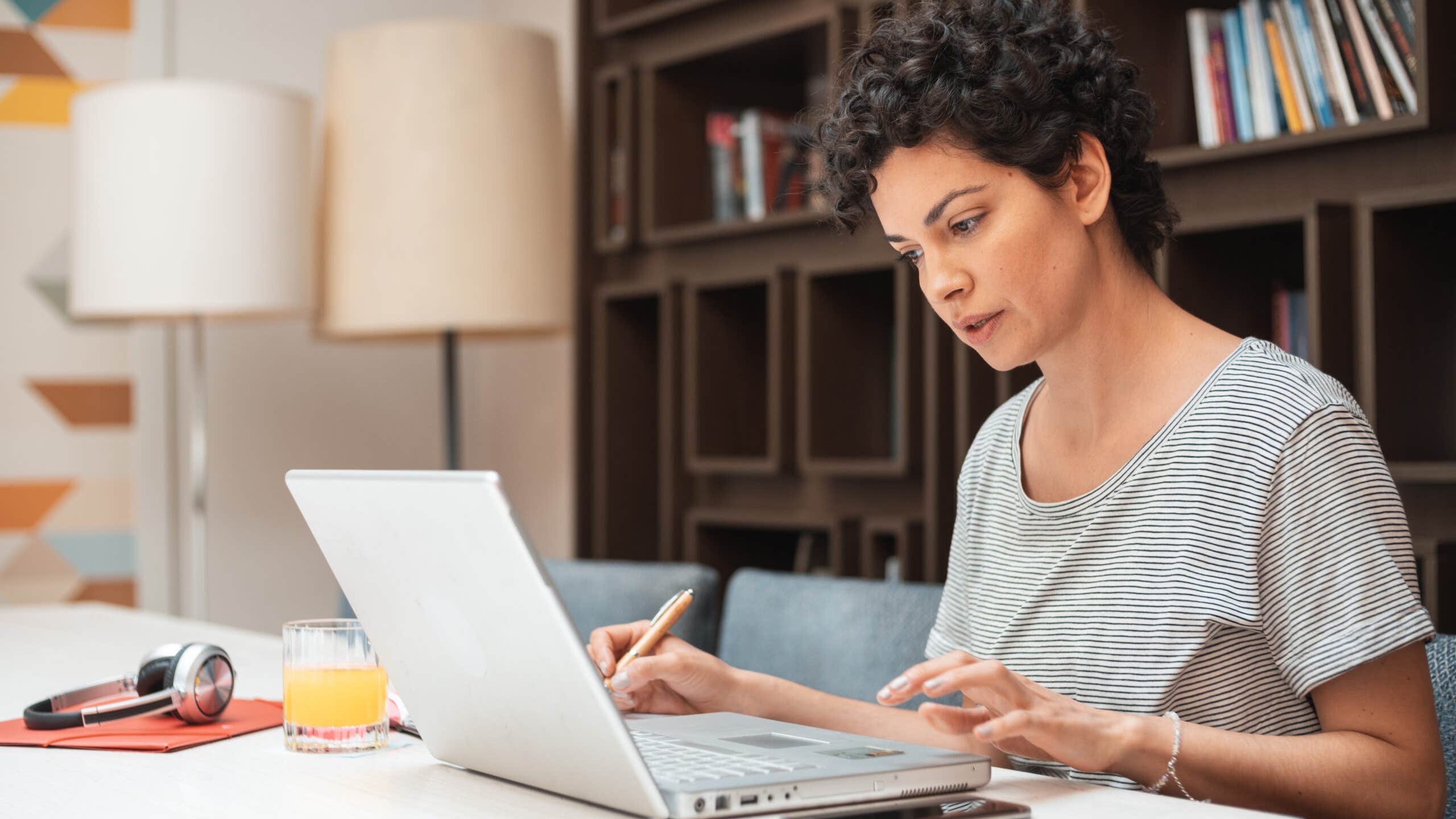 Woman comparing loans on her laptop