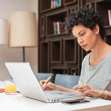 Woman comparing loans on her laptop