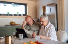 couple stressing about the rise of interest rates