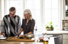 Senior couple preparing dinner