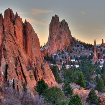 Wintry day in Colorado Springs, Colorado at Garden of Gods. Sun was setting and red rocks cast lovely glow.