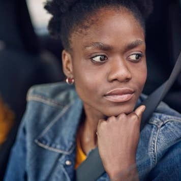 Young woman in car