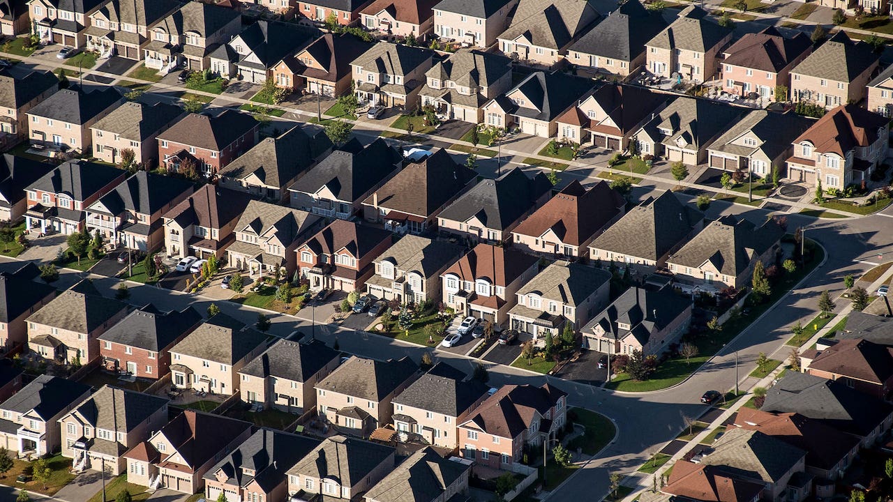 end of an era for mortgage rates - suburban homes from above
