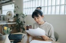 Asian women working with invoices