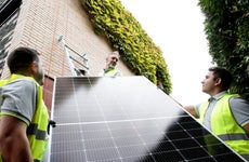 Solar technicians installing solar panels