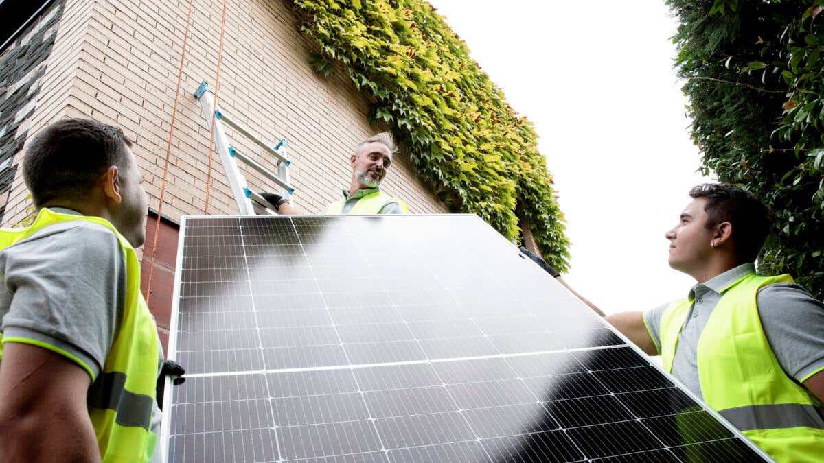 Solar technicians installing solar panels