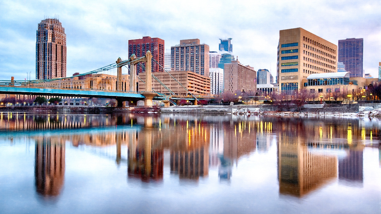 Minneapolis Downtown with Hennepin Avenue Bridge at Minnesota USA. Painterly look to downtown.