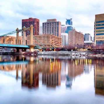 Minneapolis Downtown with Hennepin Avenue Bridge at Minnesota USA. Painterly look to downtown.