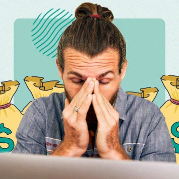 A person sitting in front of a laptop computer, their hands on their face expressing frustration.