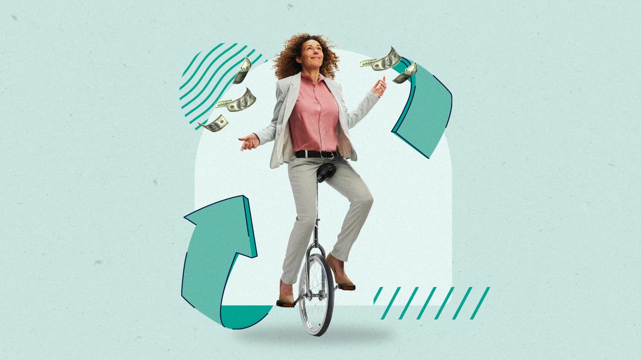A woman riding a unicycle while balancing money