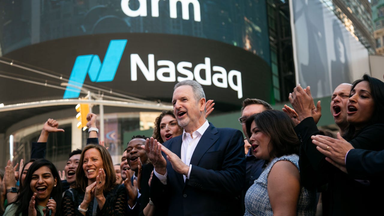 Rene Haas, chief executive officer of Arm Ltd., center, during the company's IPO at the Nasdaq MarketSite in New York, US, on Thursday, Sept. 14, 2023