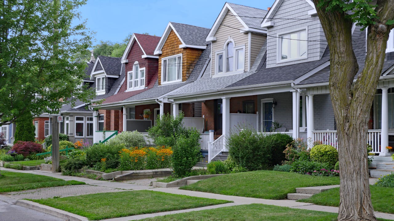 Residential street with small semi-detached houses