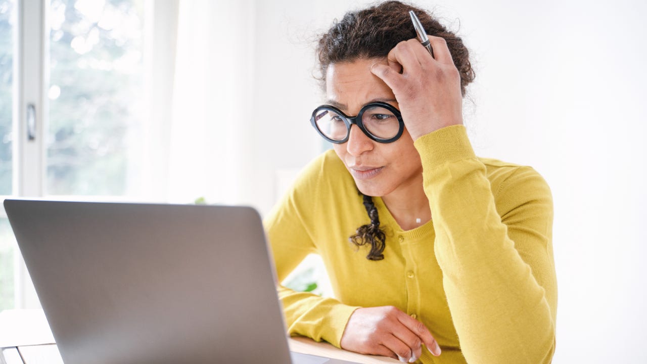 Woman is focused and concentrate at computer