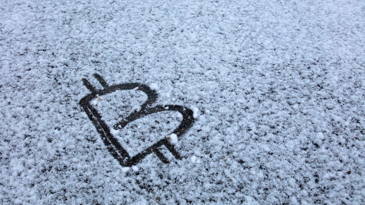 Bitcoin Sign on snow