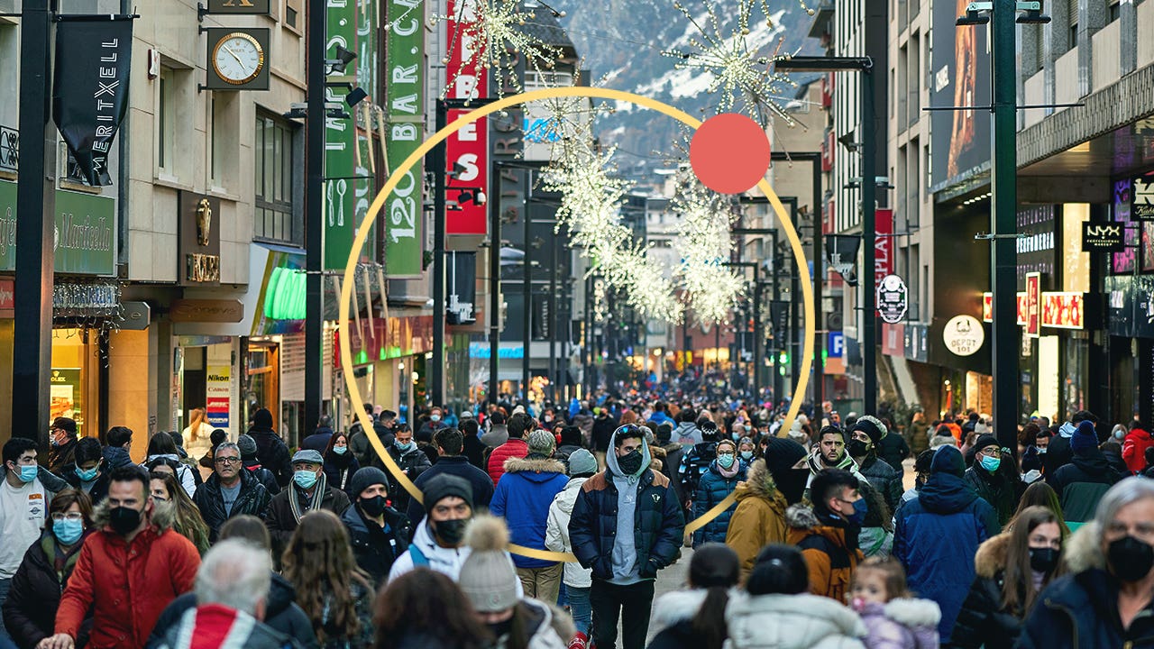 Raised view of heavy foot traffic in a downtown city center